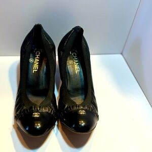 Vintage Chanel black slip on.